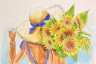 Chica con un ramo de girasoles