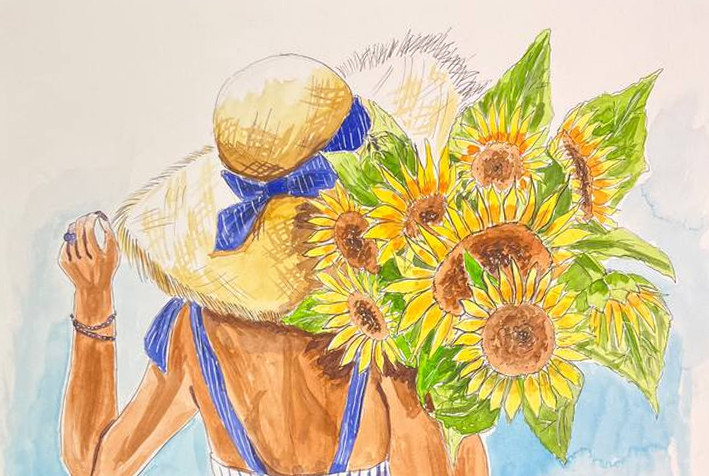 Chica con un ramo de girasoles