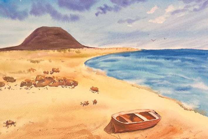 Playa de arena con barco